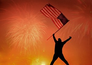 Silhouette,Of,Jumping,Patriot,Girl,Holding,The,American,Flag,On